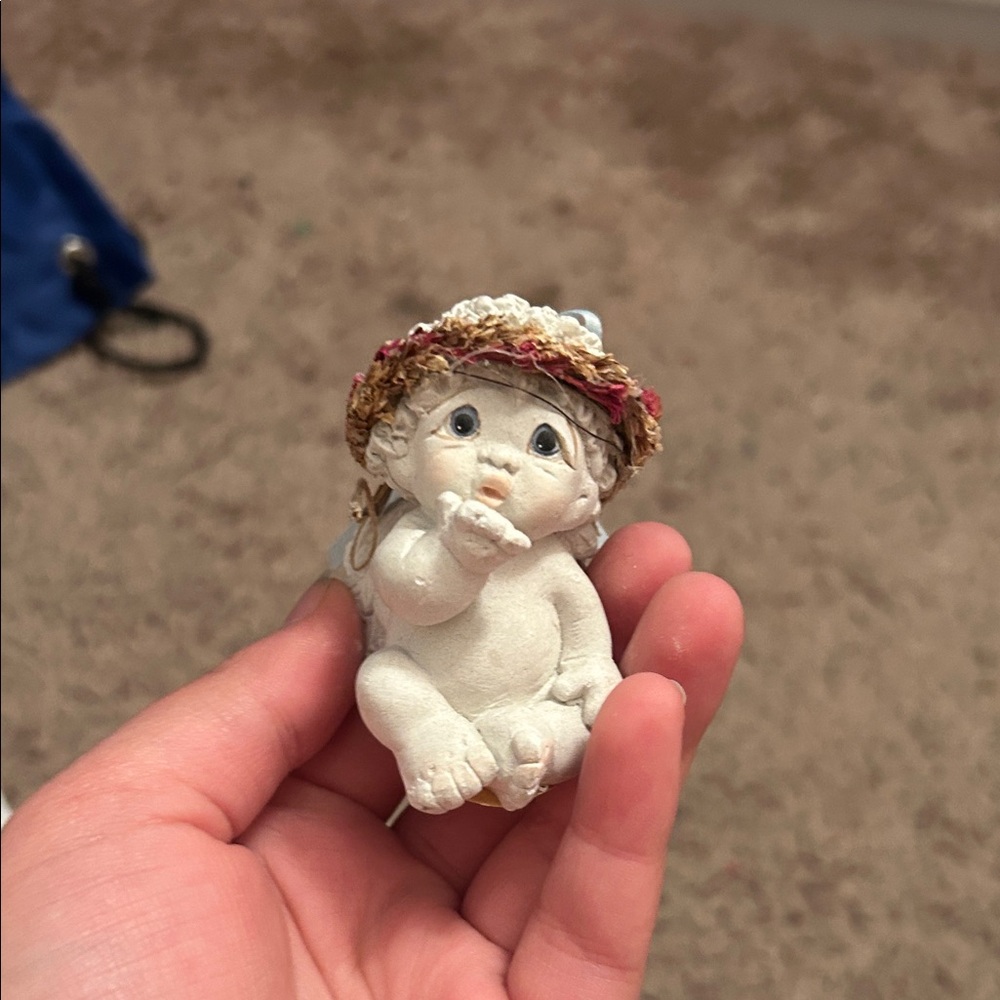 Baby kisses  Adorable White Cherub Figurine with Floral Hat